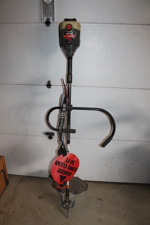 lot 1367 image: Craftsman 18 Brushwacker Gas Operated Weed Trimmer