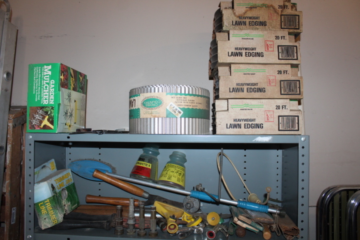 lot 1448 image: Contents of 2 Shelves - Lawn and Garden Tools and Edging