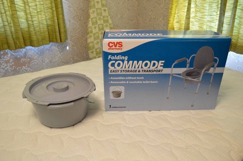 lot 1528 image: CVS Folding Commode in box