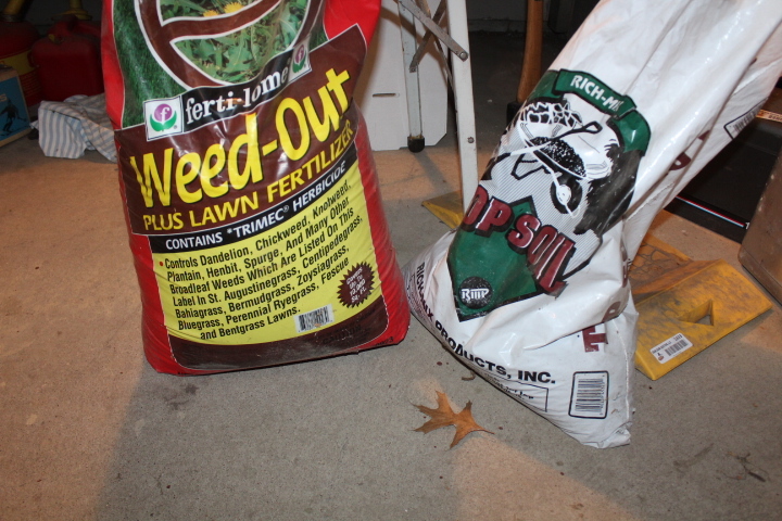 lot 1473 image: Bag of Weed-out (Unopened) and partial bag of Topsoil