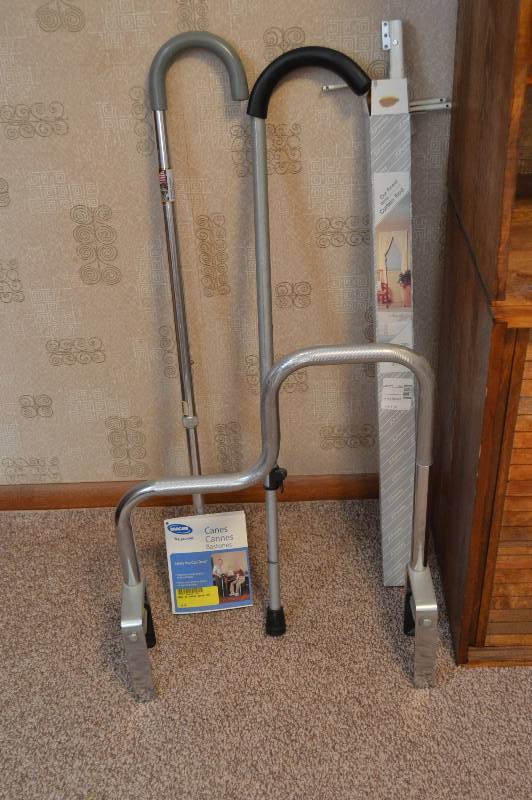 lot 1579 image: Canes & Bathtub safety rail & curtain rod