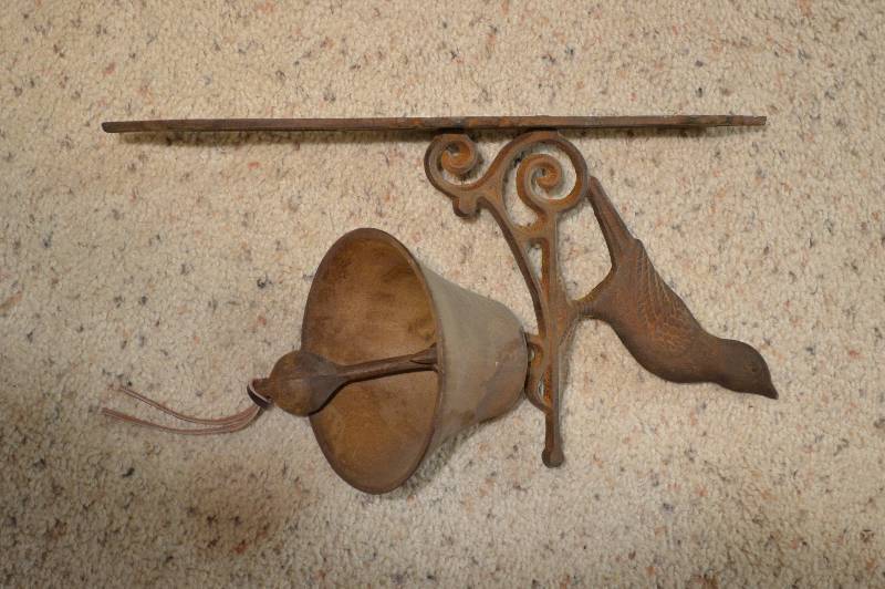lot 1167 image: Cast iron bell - bird