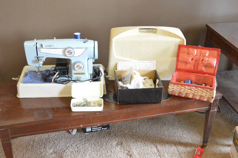 lot 1208 image: Emerson sewing machine and sewing basket