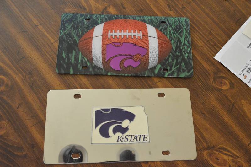 lot 1214 image: (2) K-state car tags
