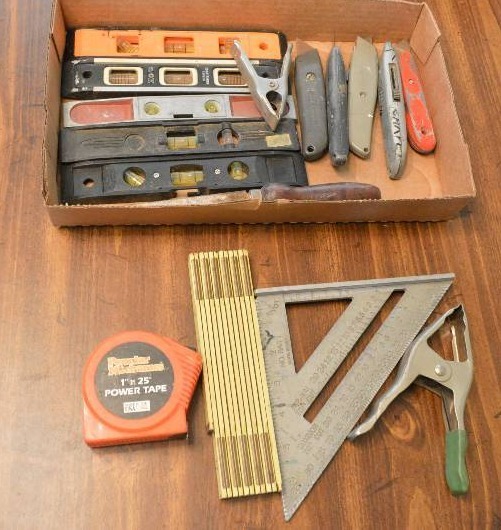 lot 1240 image: Box of tools - speed square, tape measure and levels