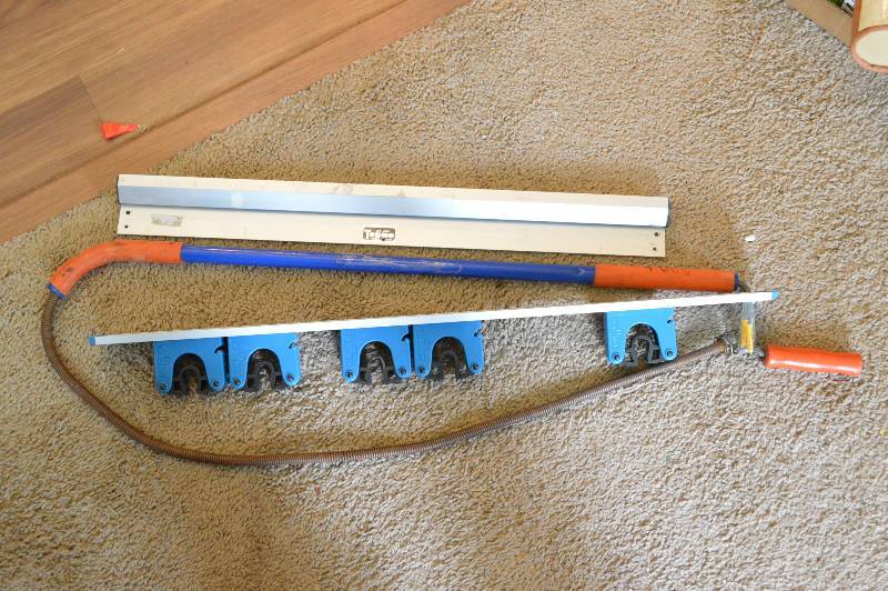 lot 1268 image: Broom holder, ticket holder, and snake