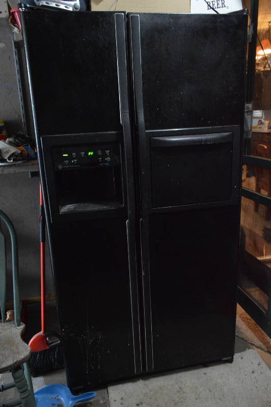 lot 1280 image: GE Profile Performance side-by-side refrigerator