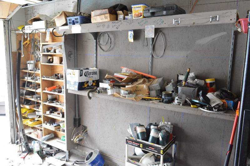 lot 1289 image: Contents of S side of garage and on top of refrigerator - bring boxes