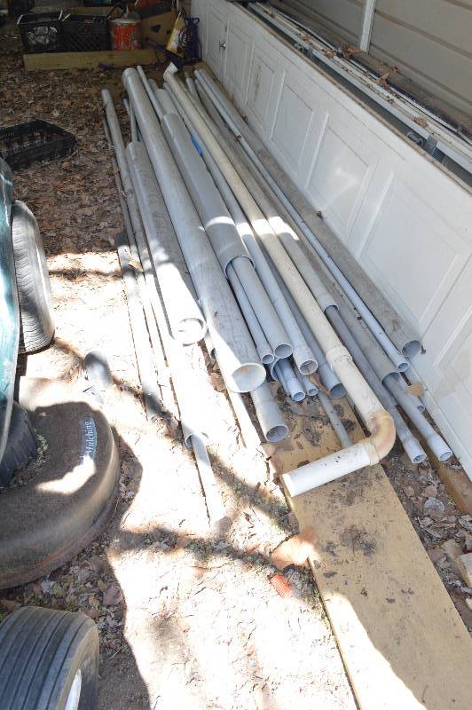lot 1974 image: Pile of Plastic pipe and conduit