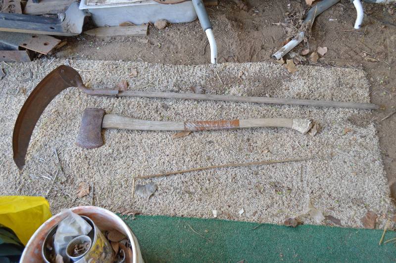 lot 1985 image: Axe and scythe (handle has been replaced)