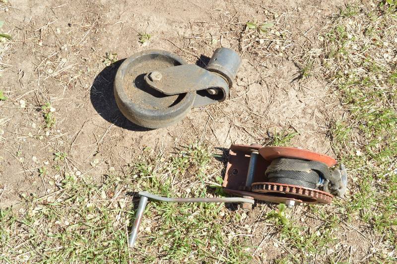 lot 1999 image: Boat trailer winch and wheel for jack