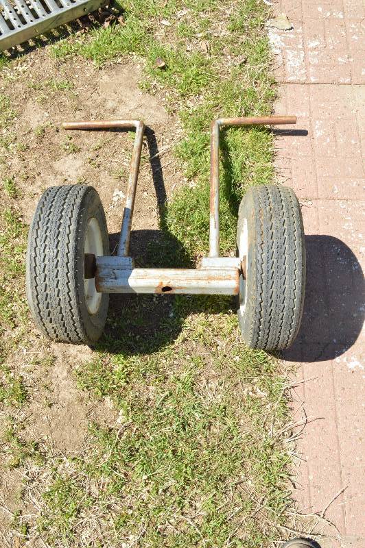 lot 2492 image: 2 tires with handle bar