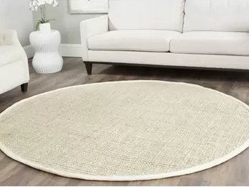 lot 33 image: Muriel Hand-Woven Ivory Area Rug 9ft Round