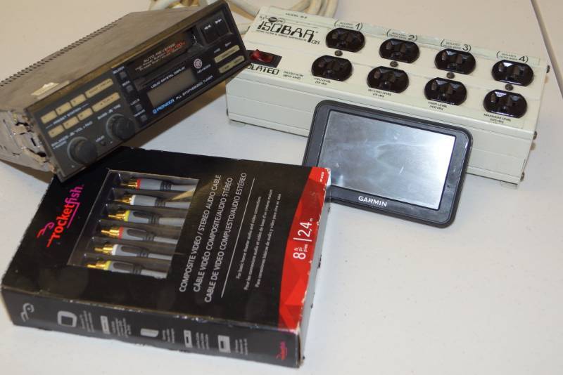 lot 49 image: 6 Socket Power SupplySurge Protector and Bonus- Car Stereo and Garmin