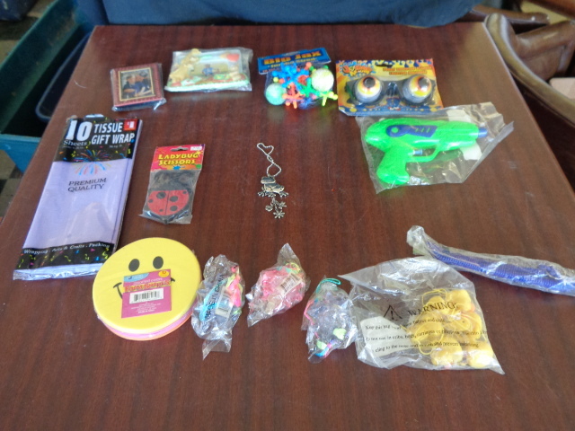 lot 6174 image: New Toys and Picture Frames