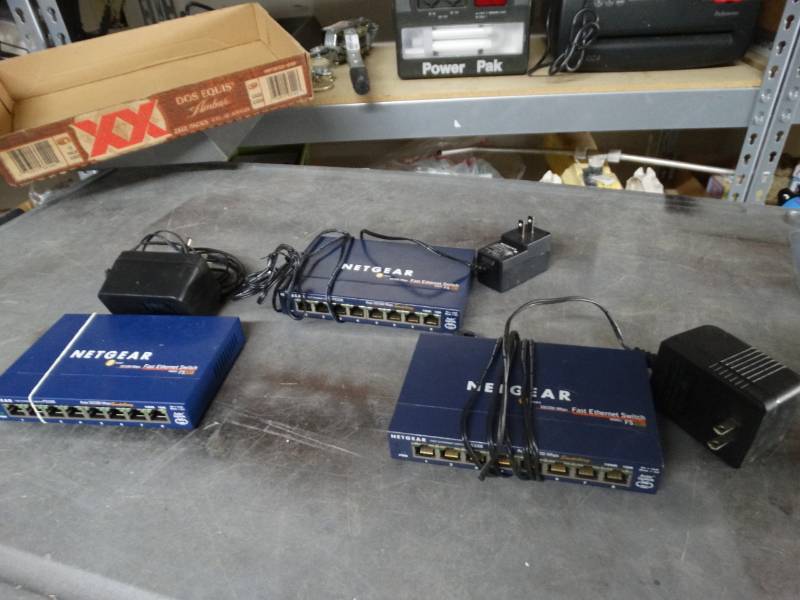 lot 8409 image: 3 netgear 8 port 10100 mbps fast ethernet switch.