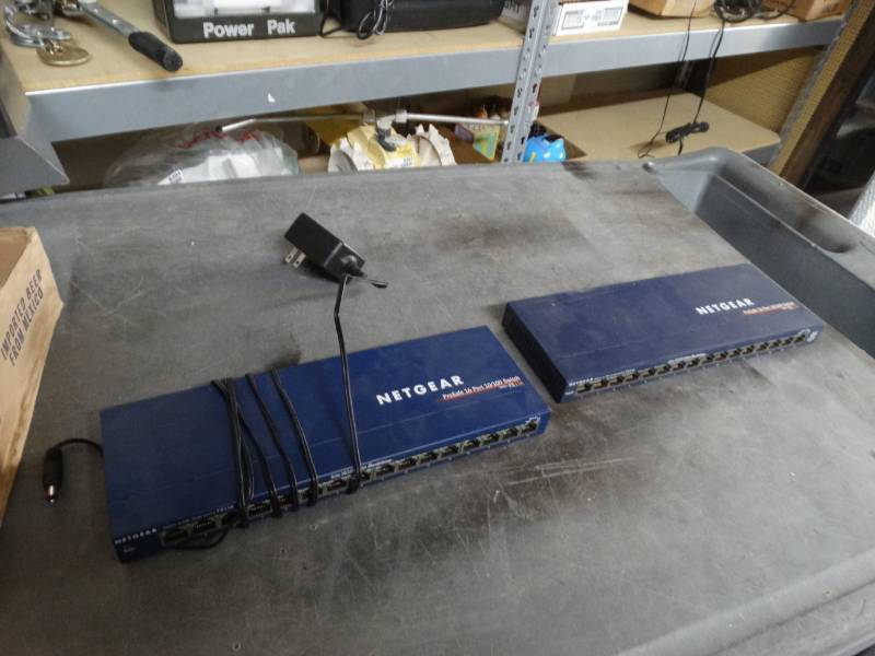 lot 8410 image: 2 netgear pro safe 16 port 10100 switch.