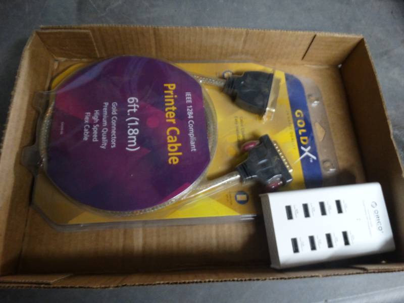 lot 8428 image: Printer cable and home power center.