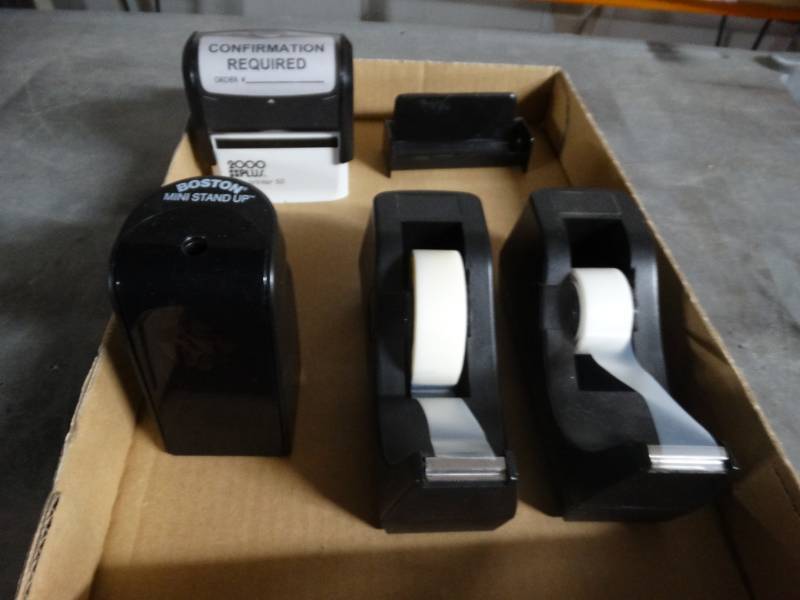 lot 8464 image: Lot of 2 tape holders, stamp, & pencil sharpener.