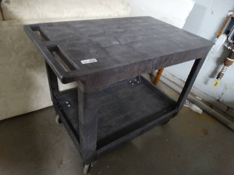 lot 8534 image: Plastic push cart.