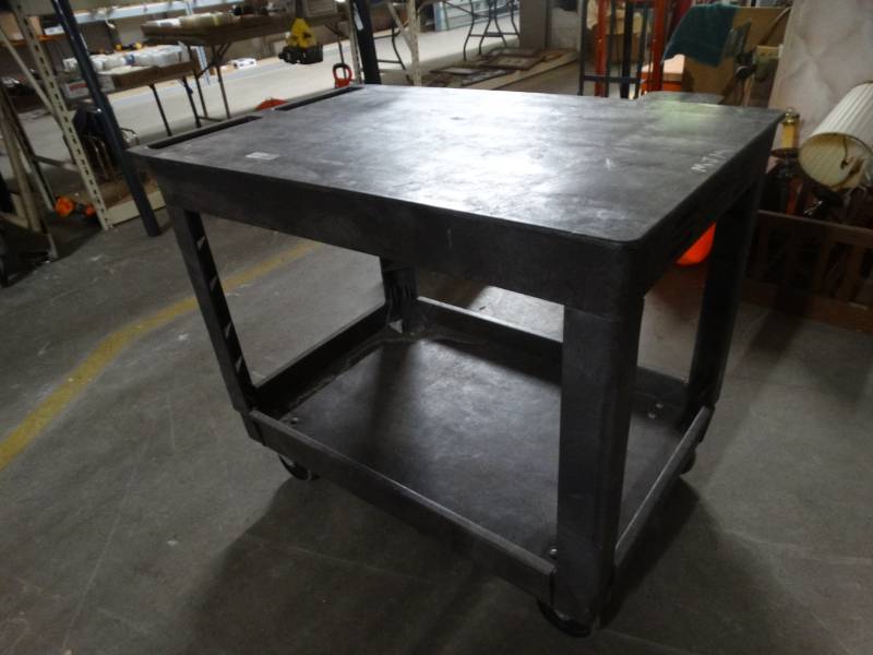 lot 8535 image: Plastic push cart.