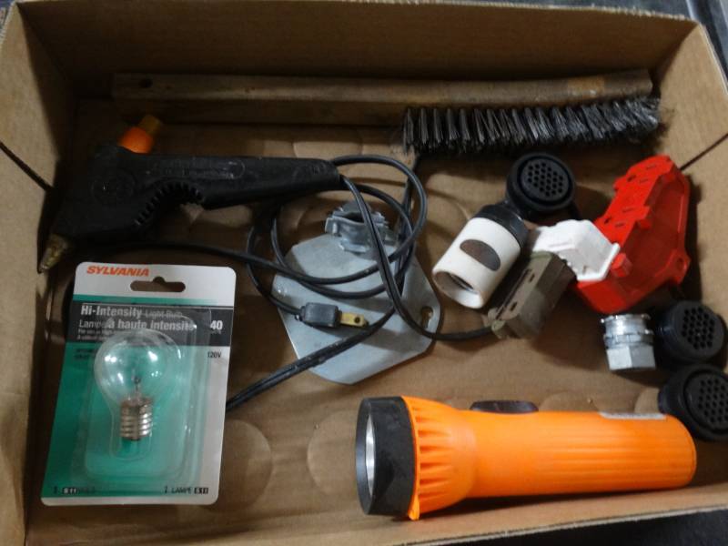 lot 8538 image: Lot of Flashlight, plugh in adapters, small hot glue gun and more.