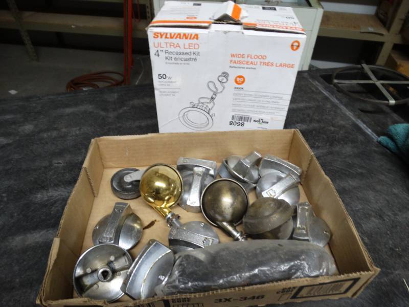 lot 8608 image: Knobs and casters.