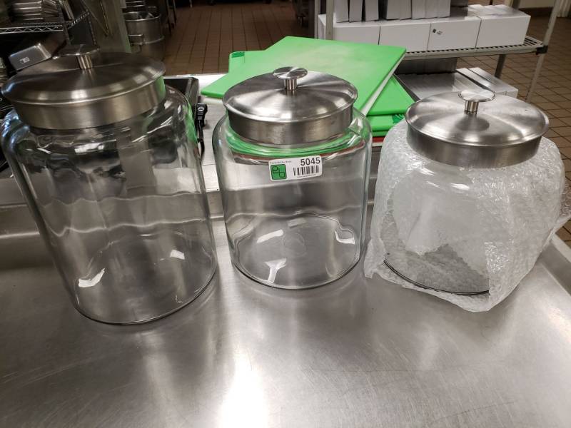 lot 5045 image: (3) Different Size Glass Containers with Lids