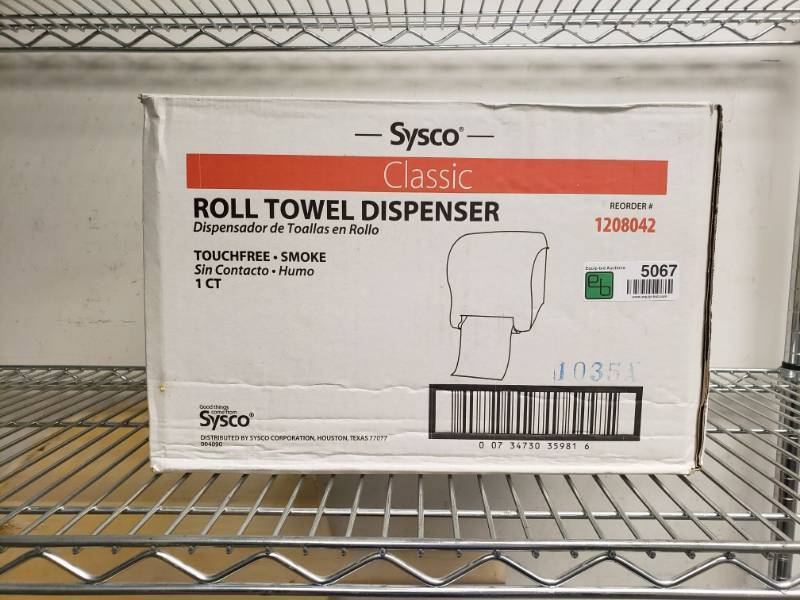 lot 5067 image: New Sysco Roll Towel Dispenser.