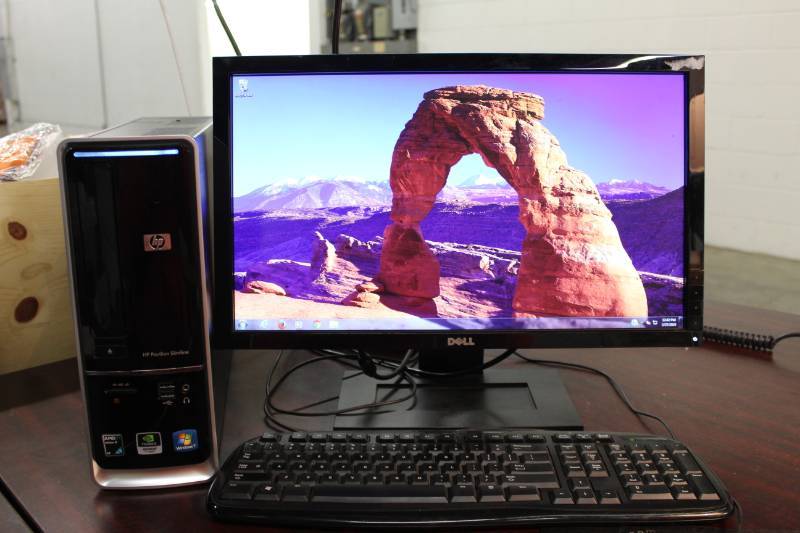 lot 1114 image: HP Slimline Windows 7 Desk Computer