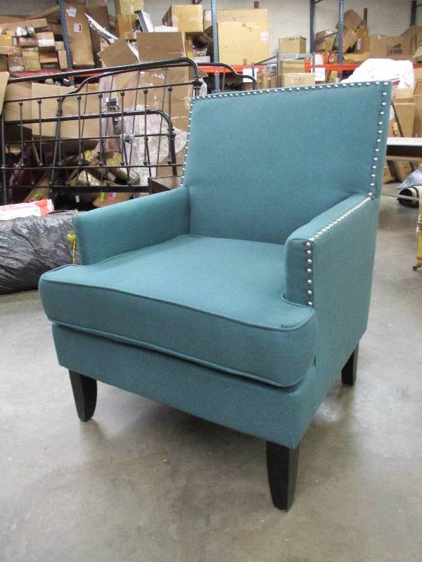 lot 157 image: Teal Living Room Chair - has a small hole in the front