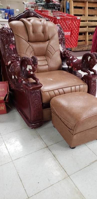 lot 2103 image: Large Ornate Rams Decorated Recliner  Ottoman