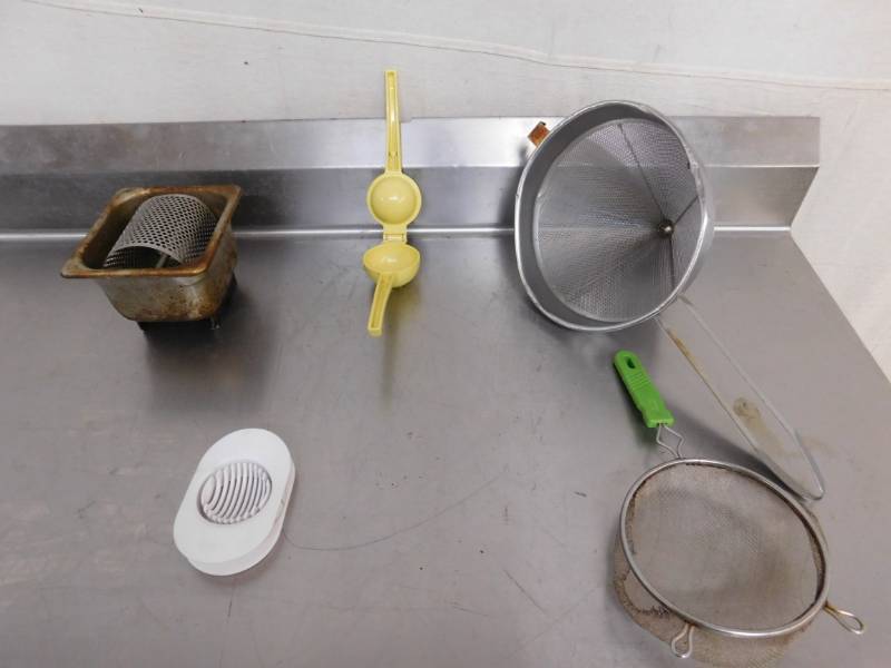 lot 1769 image: Butter Roller, Fruit Slicer, Fruit Squeezer, Fryer Strainer and Chinese Hat
