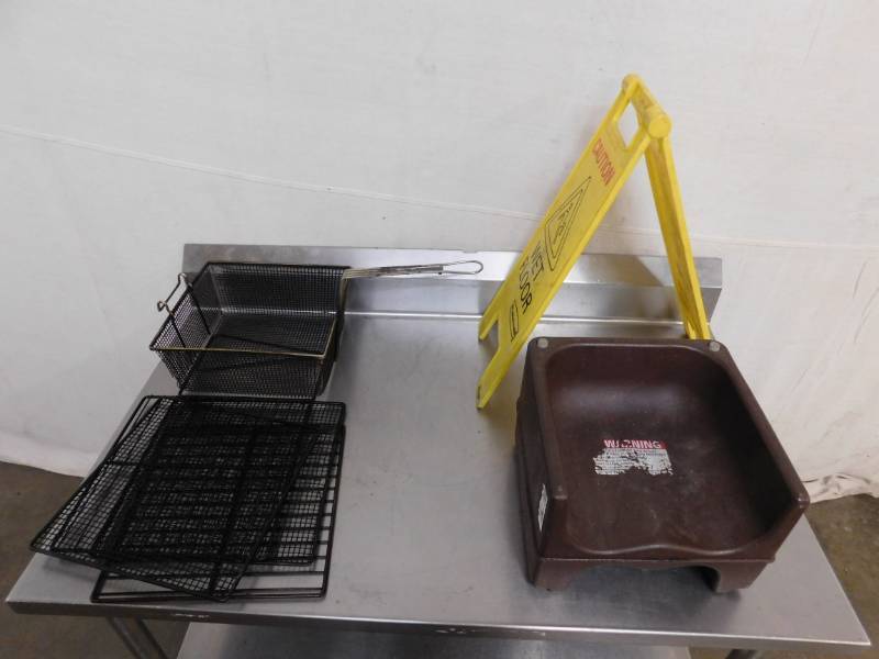 lot 1785 image: Fryer Basket, Child Booster Seat and Wet Floor Sign
