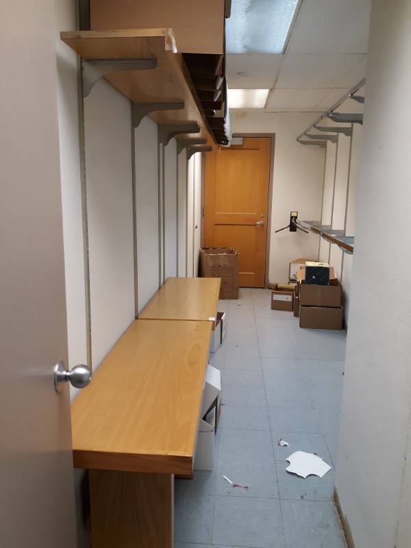 lot 2028 image: All Shelves and Tables of Storage Room, and Door