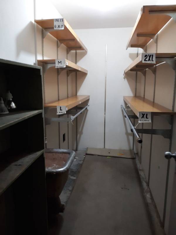 lot 2031 image: Contents of Storage Room and Metal Door