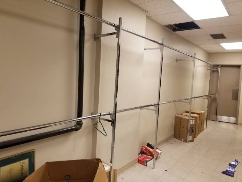 lot 3024 image: Wall Mount Clothes Racks