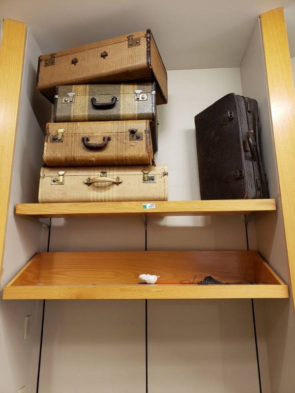lot 3256 image: (2) Wood Shelves with (5) pieces of Antique Suitcases.
