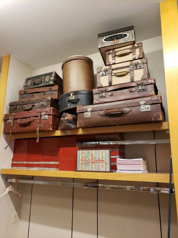 lot 3257 image: (2) Wood Shelves with (12) pieces of Antique Suitcases.
