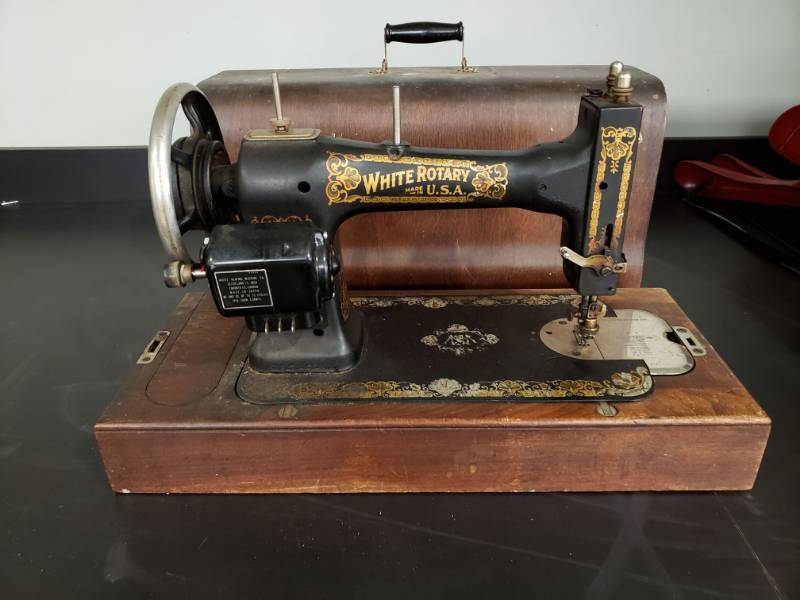 lot 4542 image: White Rotary Antique Sewing Machine with Case.