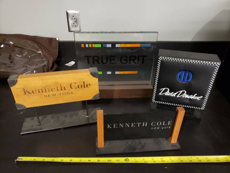 lot 4556 image: Various Signs. Kenneth Cole, True grit, and more