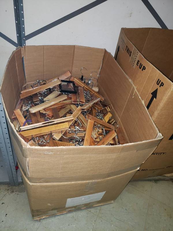 lot 9017 image: Box of wooden pant hangers