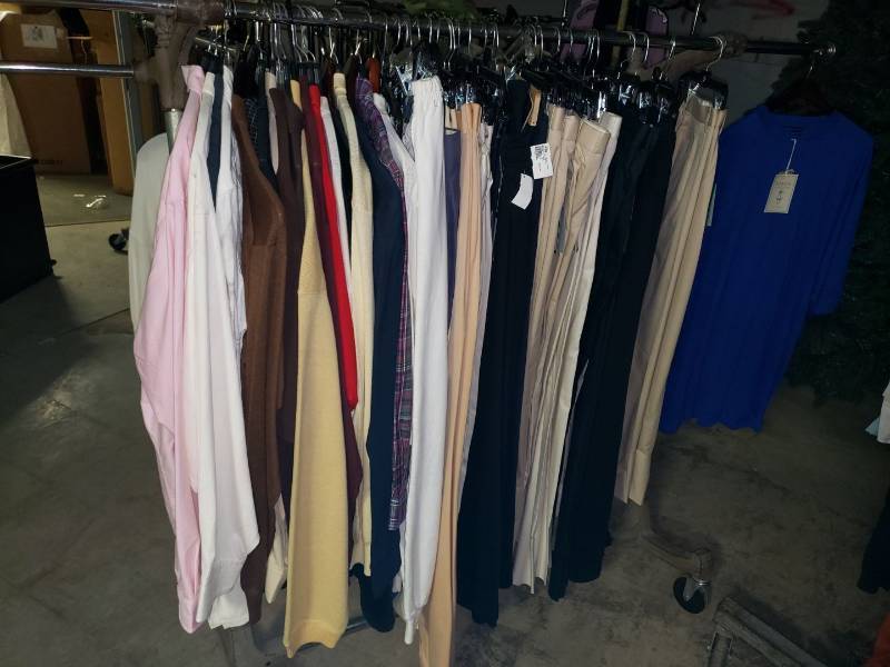 lot 9024 image: Rack of clothes
