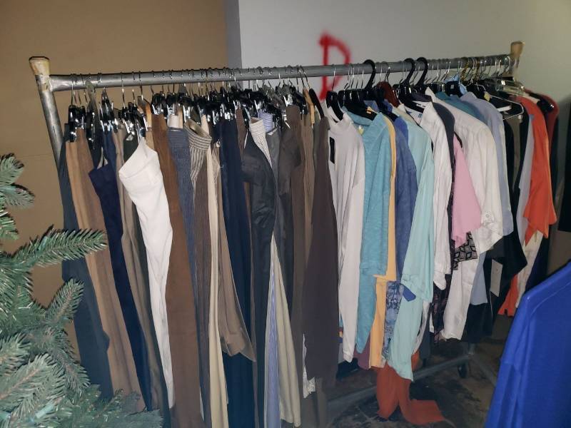 lot 9025 image: Rack of clothes
