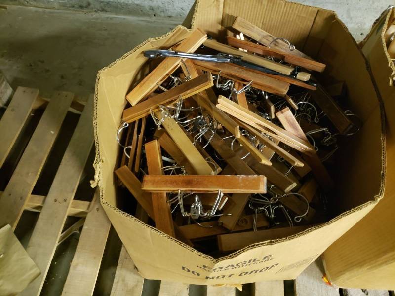 lot 9036 image: Box of wooden pants hangers