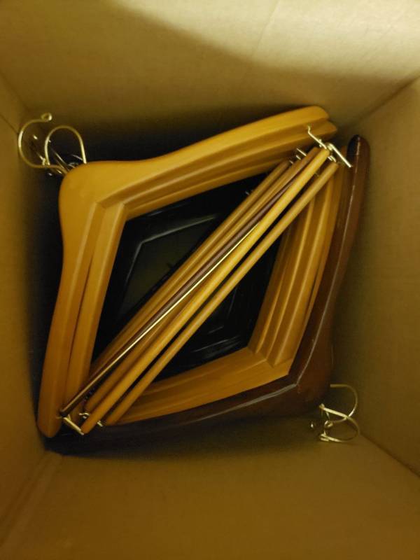 lot 9039 image: Box of wooden clothes hangers