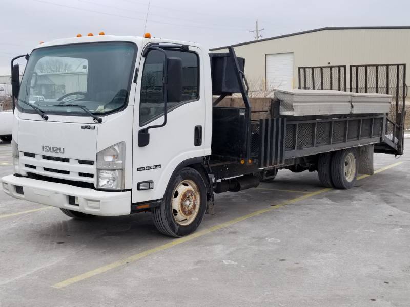 lot 1 image: 2009 Izuzu NPRHD Lawn Service Bed Truck