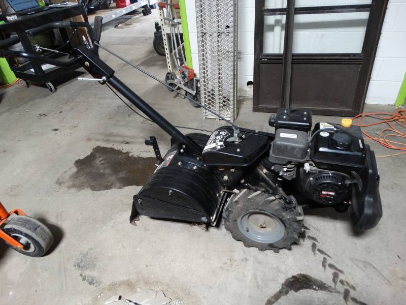 lot 8869 image: Craftsman 18 dual directional tine rototiller- Looks Like New