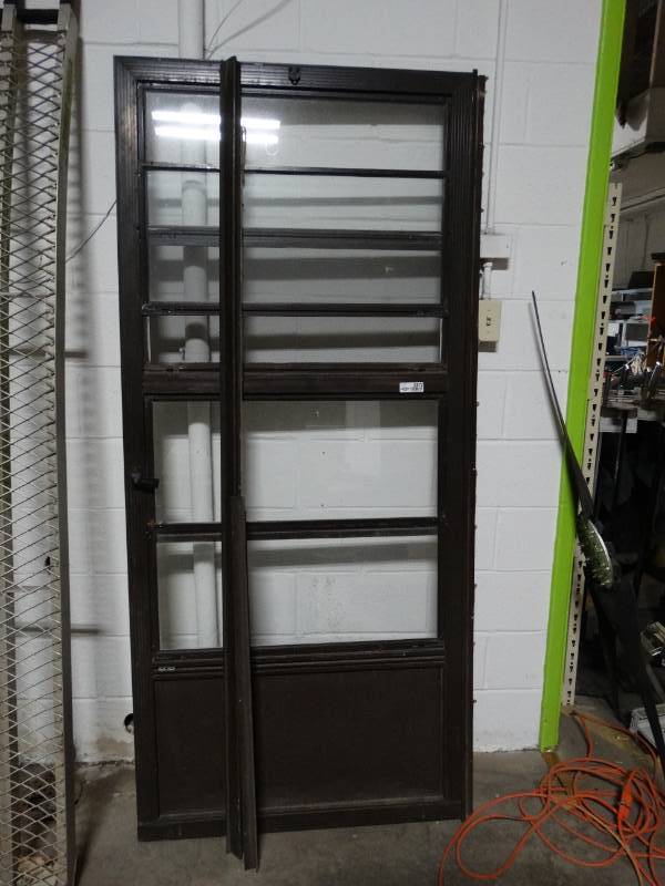 lot 8872 image: Storm door- 36 x 80