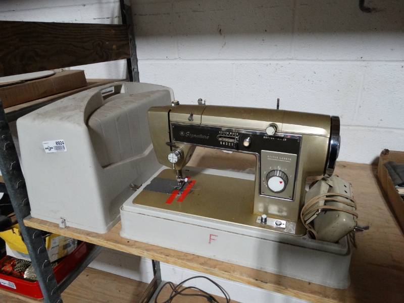 lot 8924 image: Signature sewing machine w case